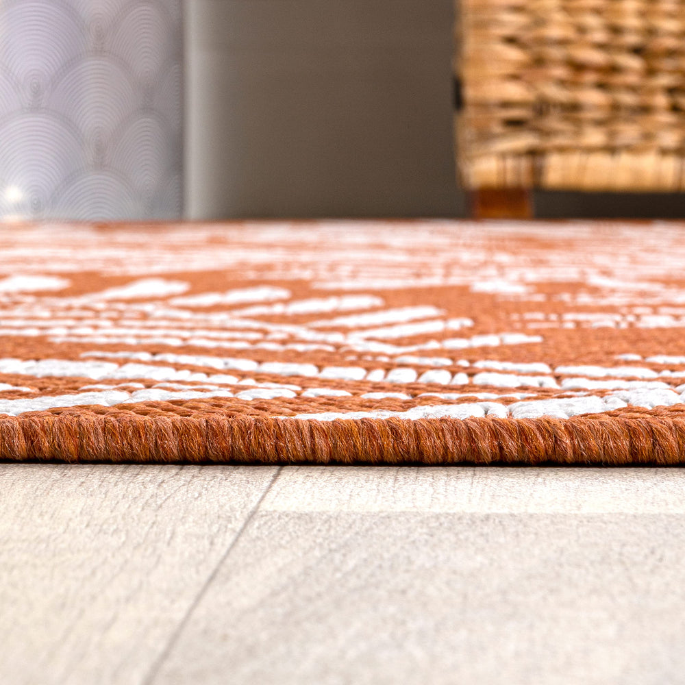 Side view of JONATHAN Y Palm Frond Runner Rug texture