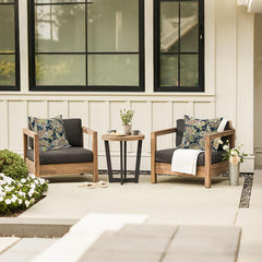 Side view of LVTXIII 20x20 decorative pillows outdoors