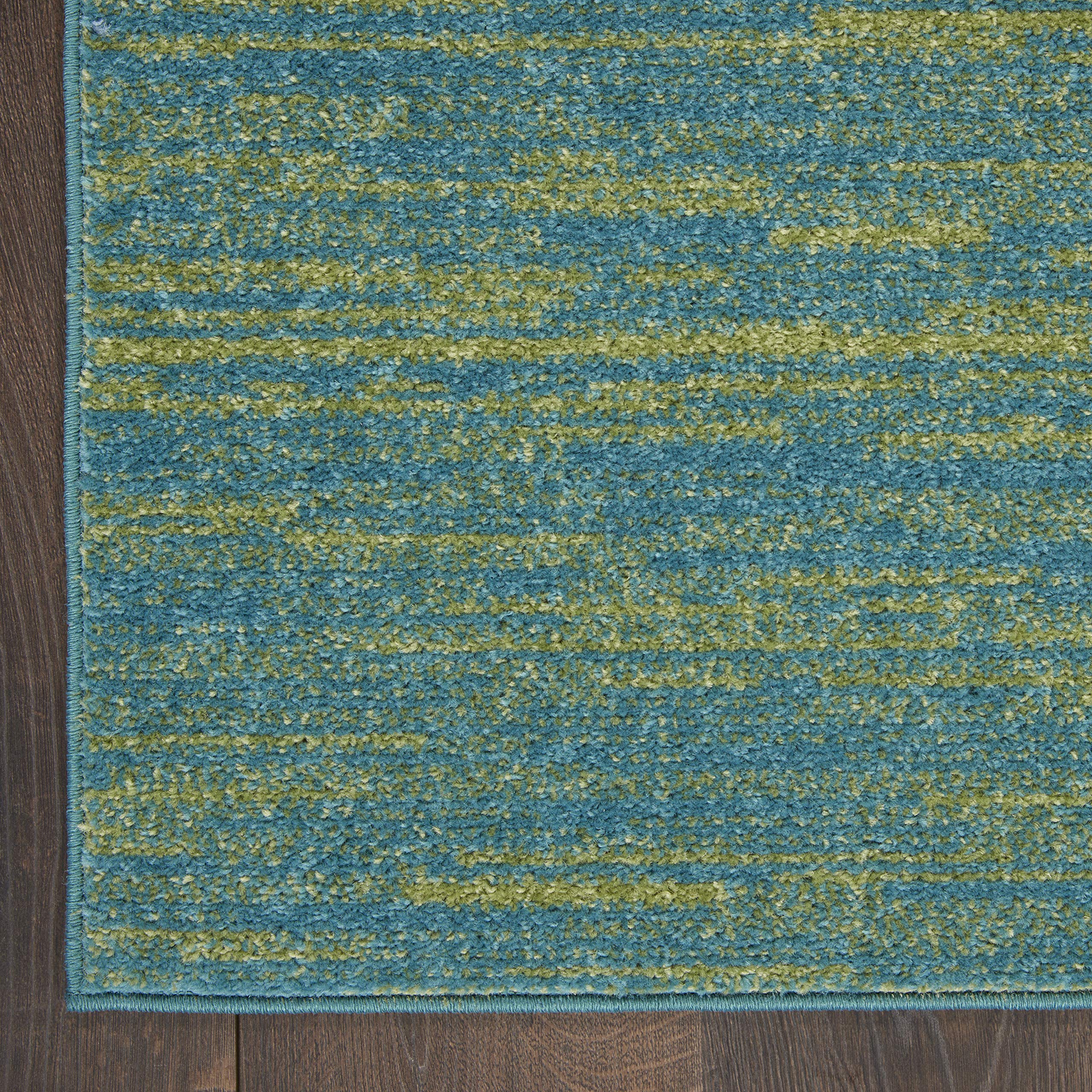 Side view of Nourison Essentials area rug
