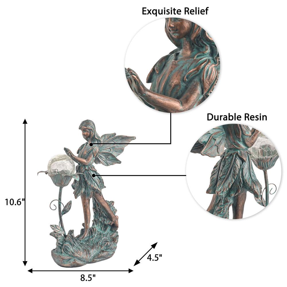 Side view of the bronze fairy statue holding a flower