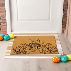 Side view of the decorative bunny doormat with natural texture