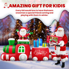 Side view of the inflatable Christmas train featuring a penguin and snowman