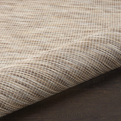 Side view of the Nourison Positano rug showing flat weave