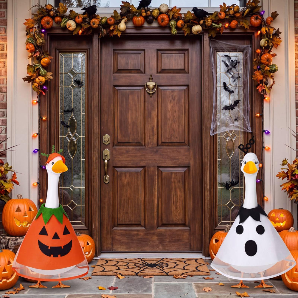 Side view of the pumpkin costume on a lawn goose