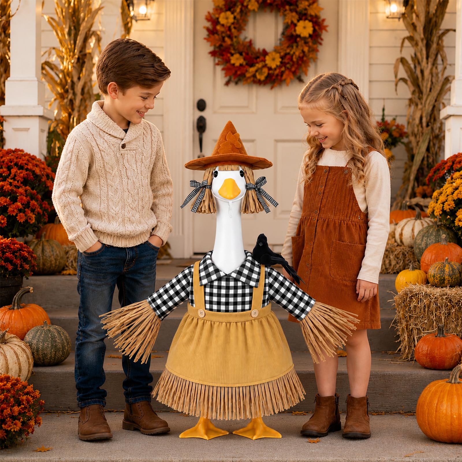 Side view of the scarecrow goose outfit set on a porch