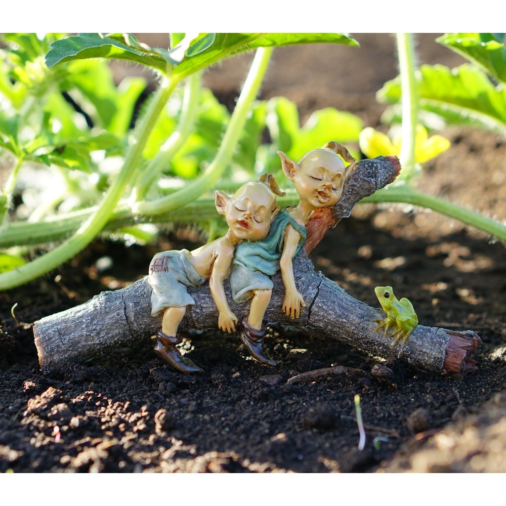 Side view of Top Collection Miniature Fairy Garden Pixies on log