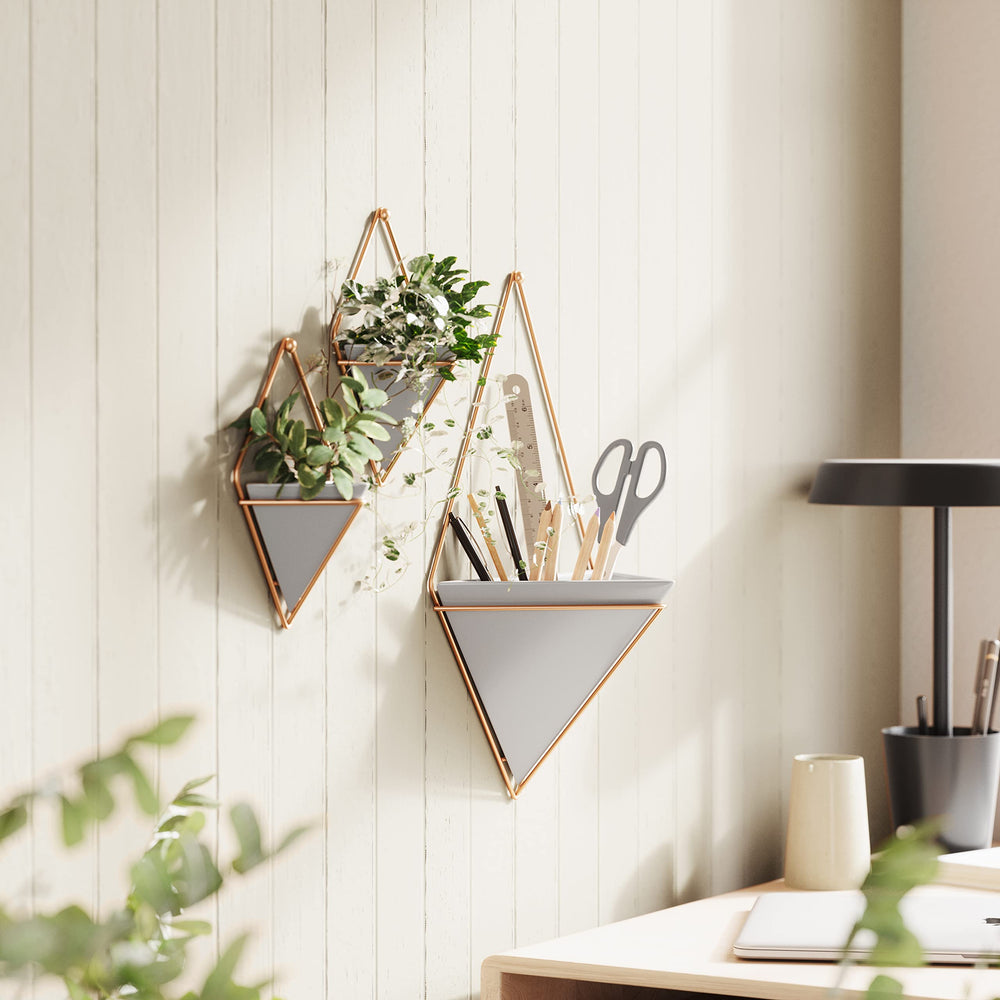 Side view of Umbra Trigg Hanging Planter mounted on wall