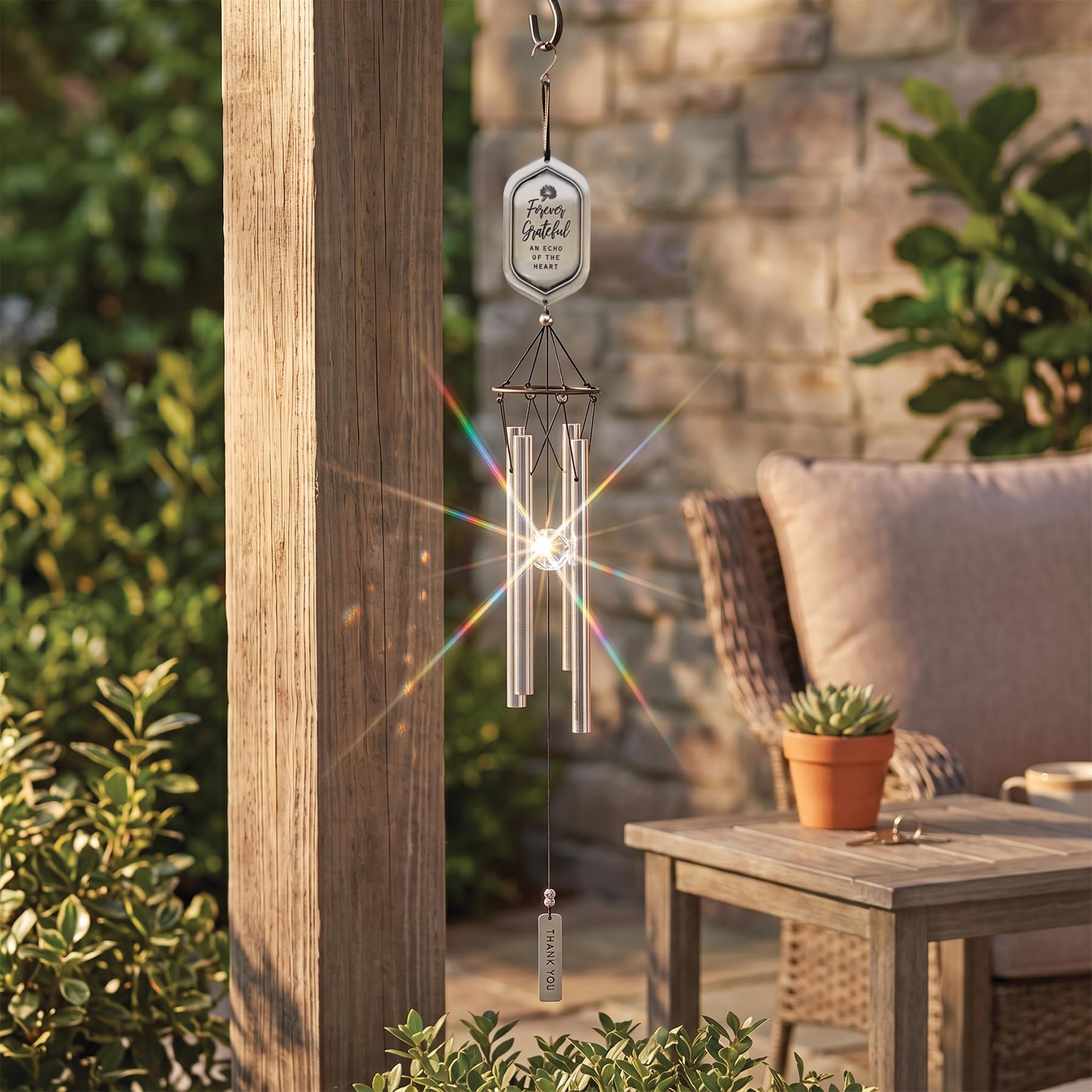 Side view of wind chime showcasing crystal ball and silver beads