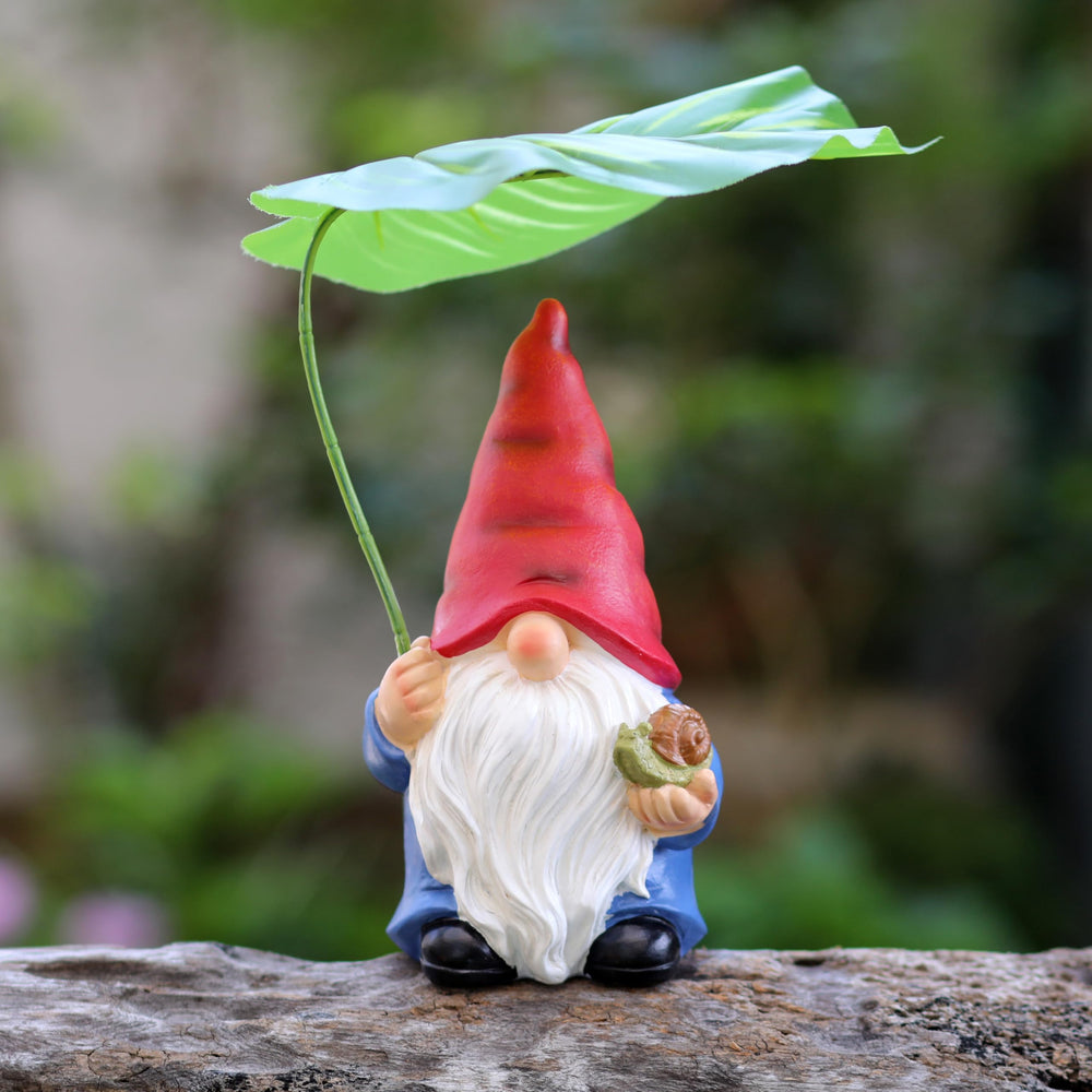 Side view of WSHMZYHOME Garden Gnome Statue holding a leaf umbrella