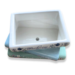 Side view showing ribbed detailing of the ceramic planter