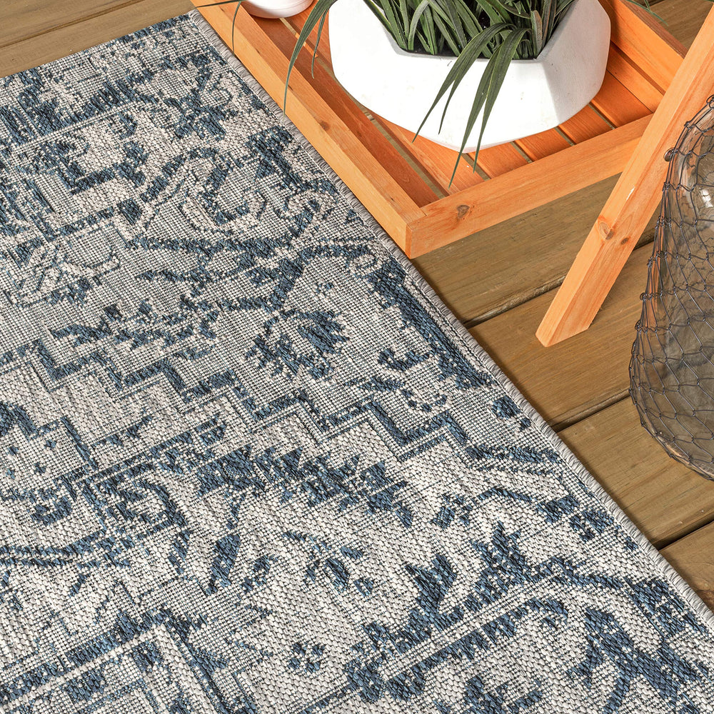 Side view showing the low-pile construction of the rug
