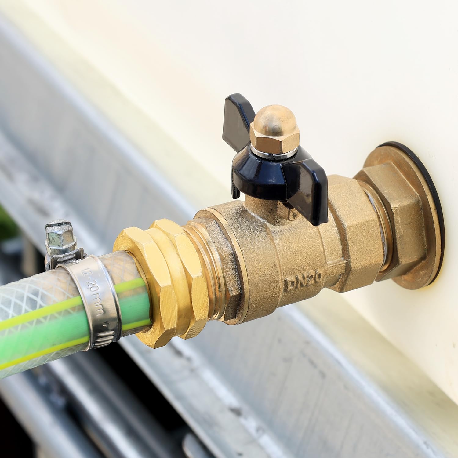 SIGURANTA 3/4" Hose Fitting Female Connector in use on a garden hose