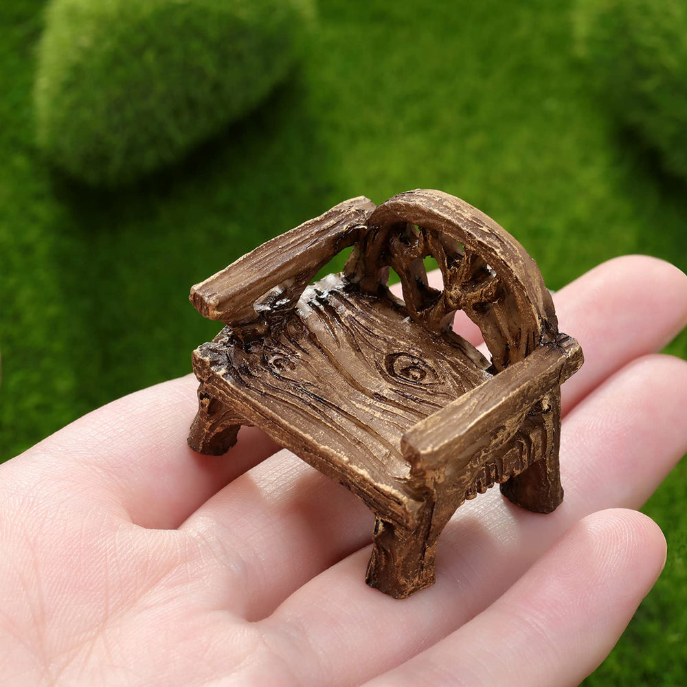 Skylety miniature garden furniture set displayed in a garden setting