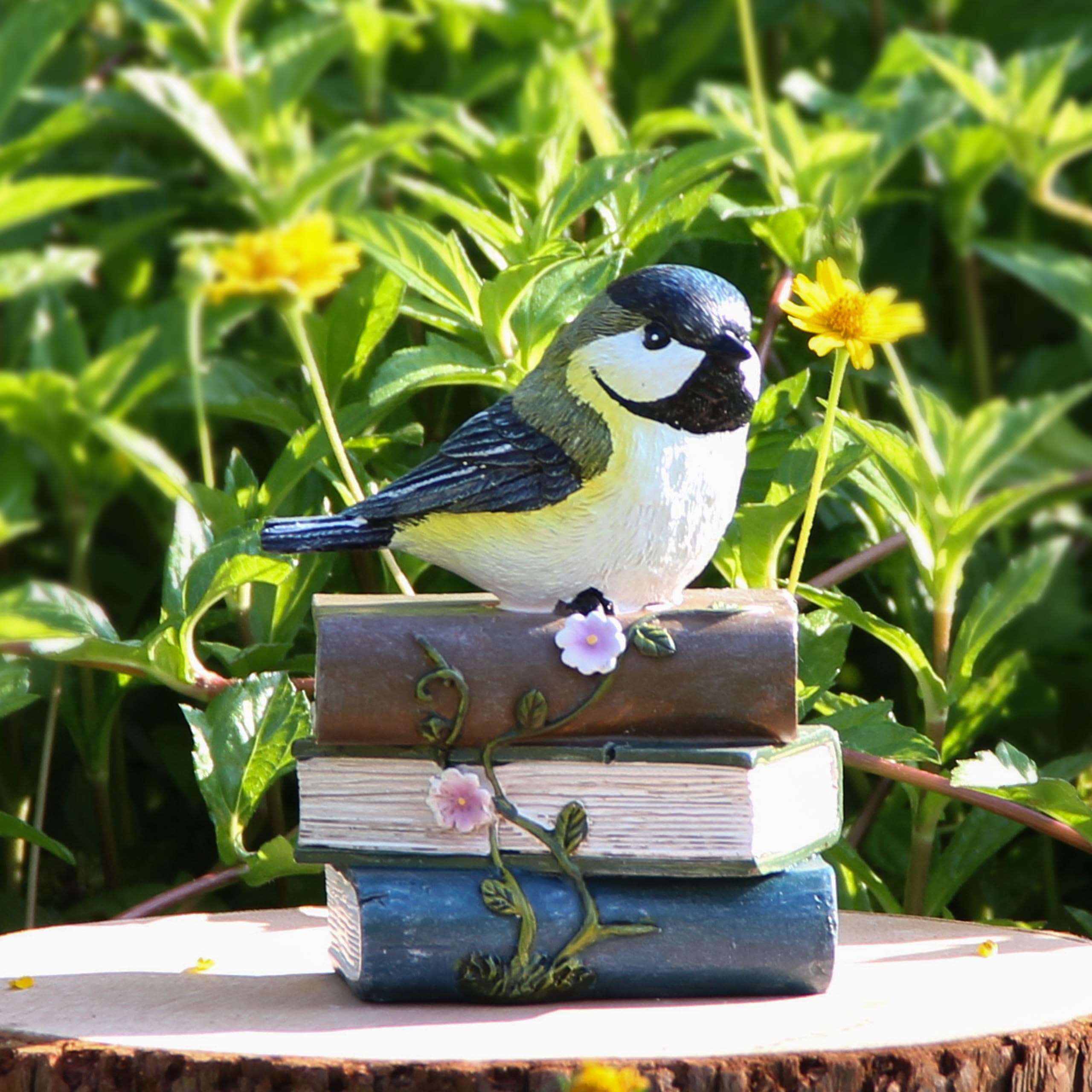 Smadeer Bird Statue in a colourful garden setting