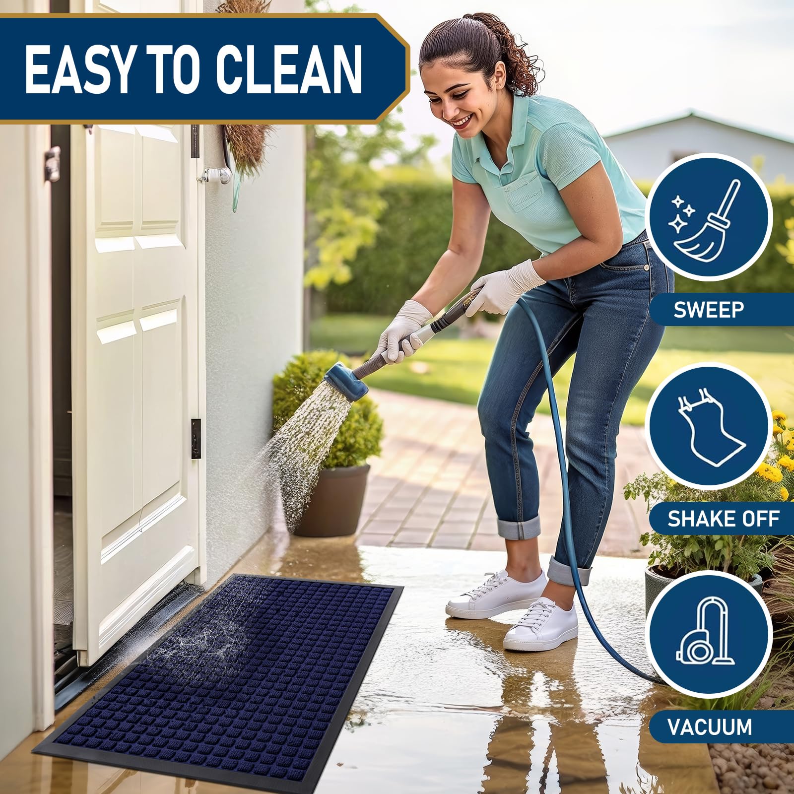 Smiry doormat being cleaned with a hose