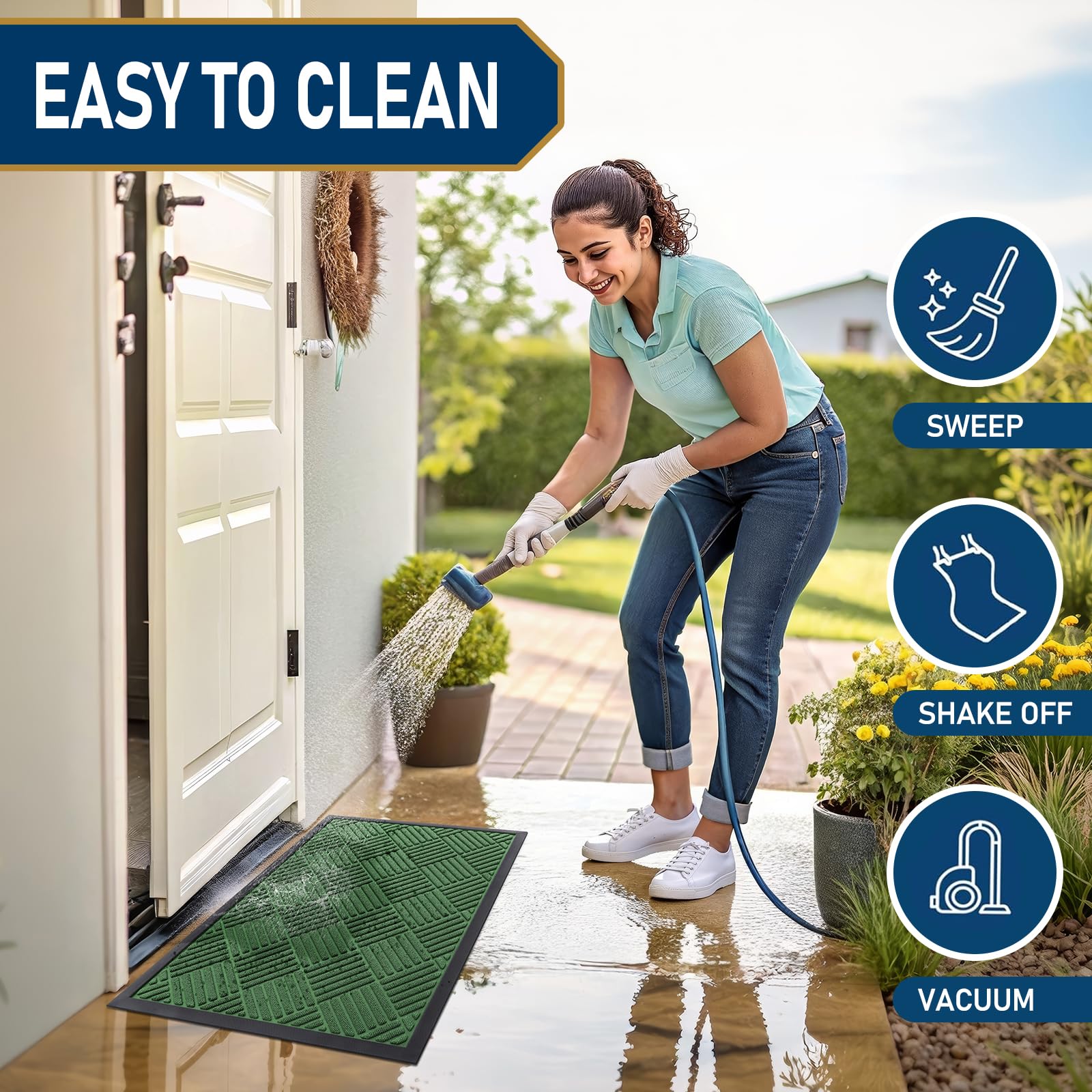 Smiry doormat being cleaned with a hose