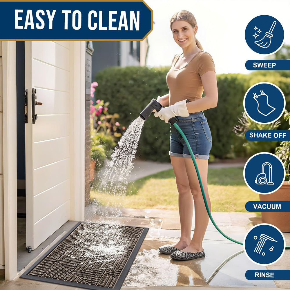 Smiry doormat being cleaned with a hose
