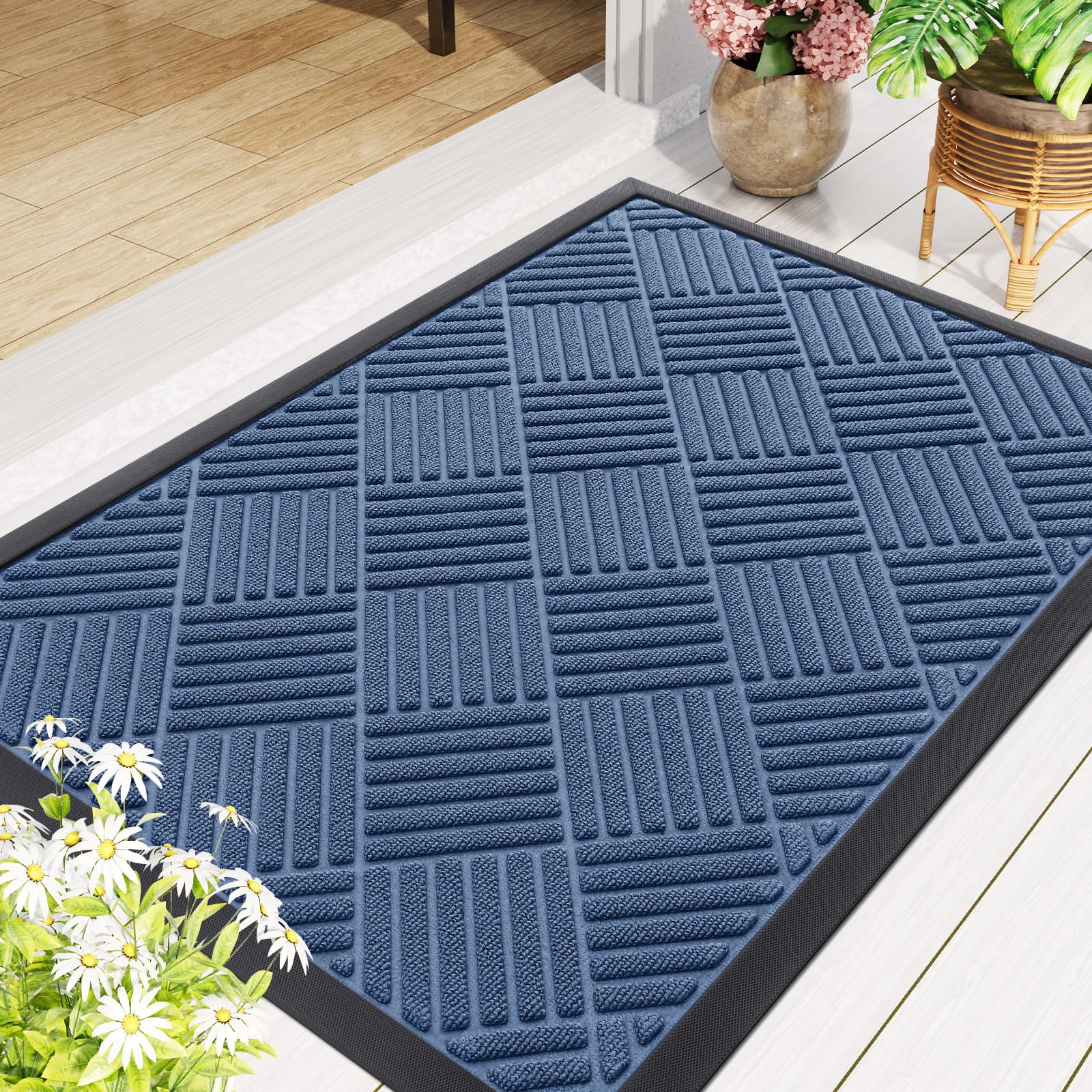 Smiry doormat being cleaned with hose