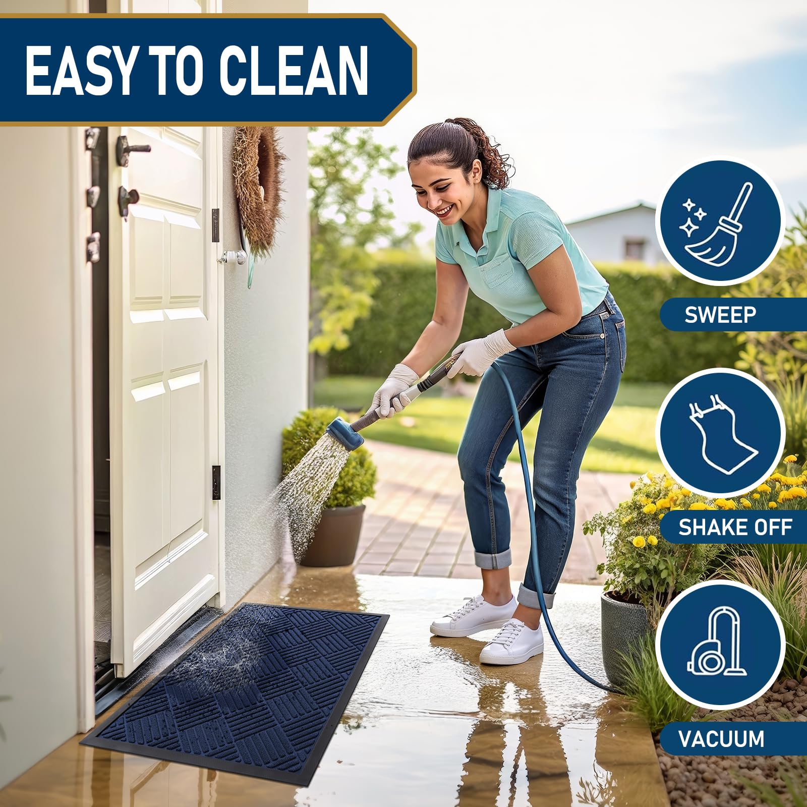 Smiry Front Door Mat being cleaned with a hose