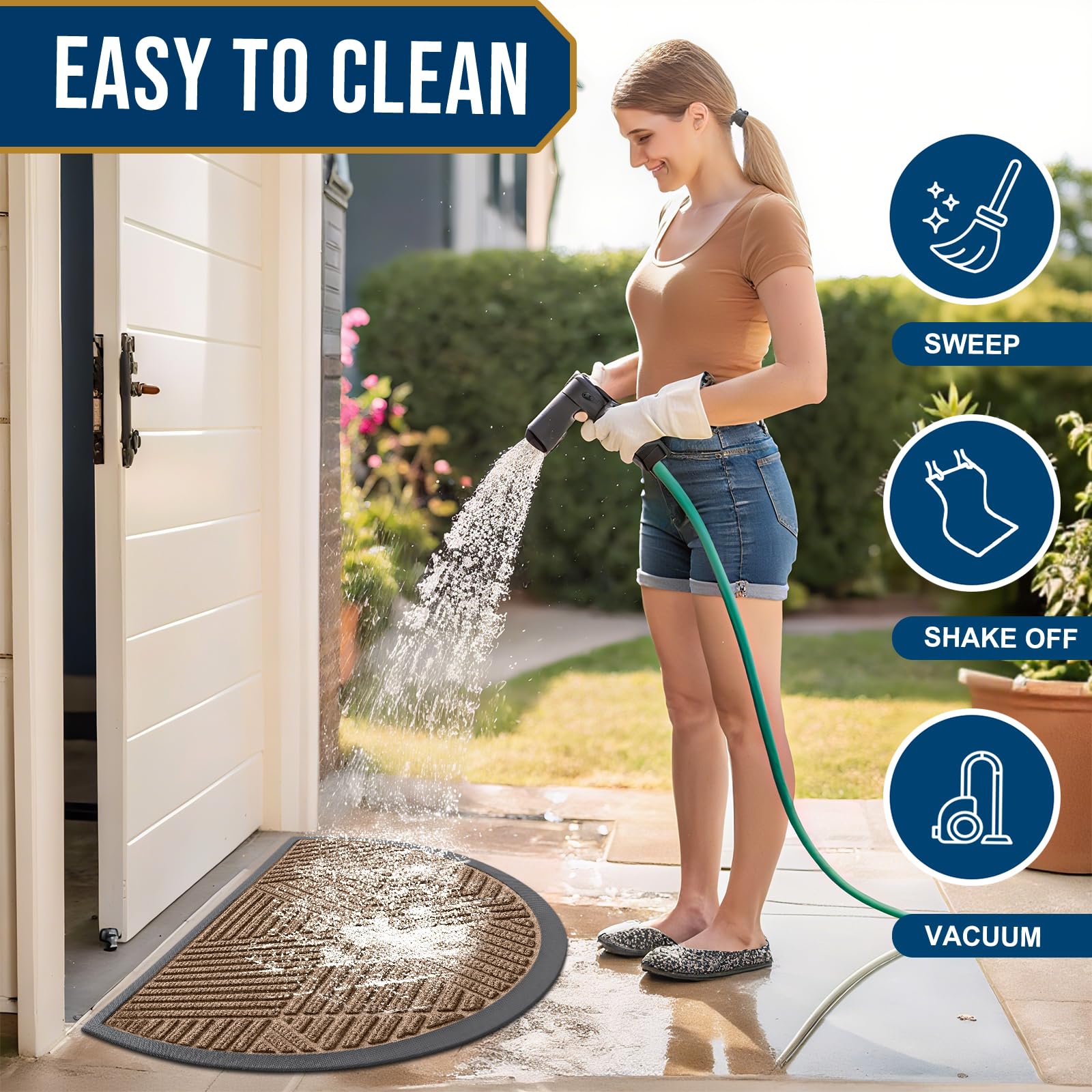 Smiry Half Circle Door Mat being cleaned with a hose
