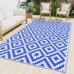 Smiry Outdoor Rug 4x6 ft in white and blue geometric pattern