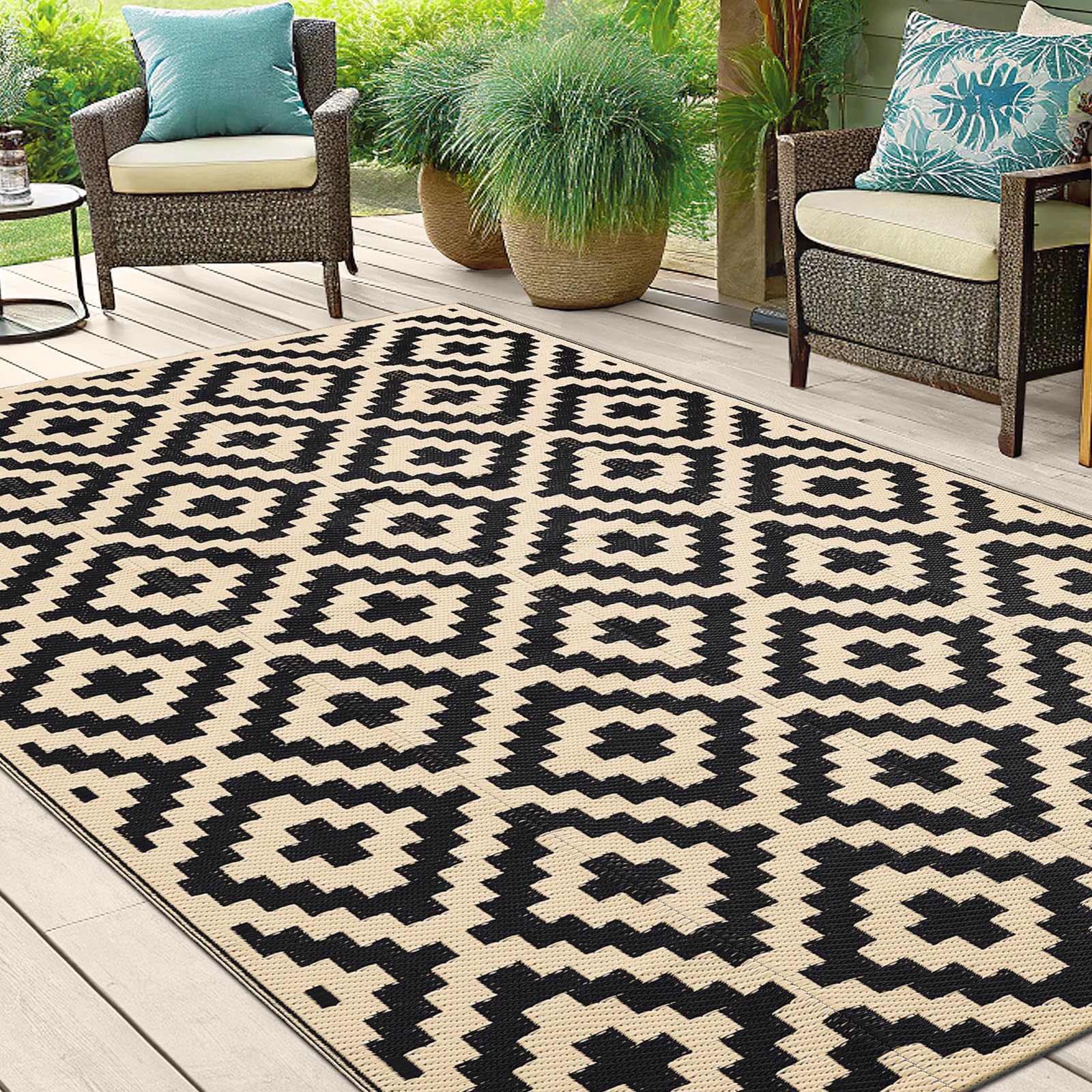 Smiry Outdoor Rug 5x8 ft being cleaned with a hose