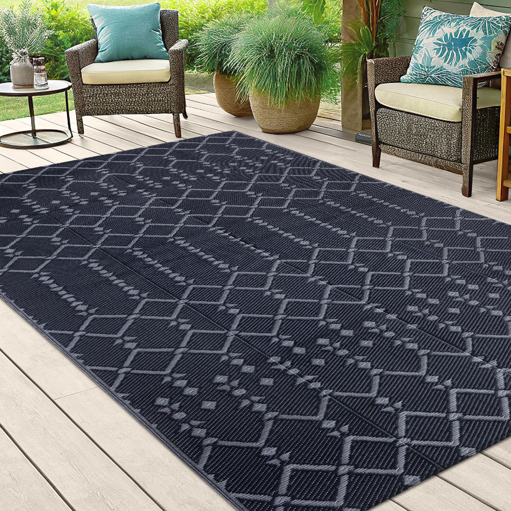 Smiry Outdoor Rug 5x8 ft on a patio