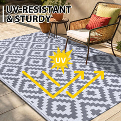 Smiry Outdoor Rug 5x8 ft on a patio setting