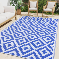 Smiry Outdoor Rug 6x9 ft in white and blue geometric pattern
