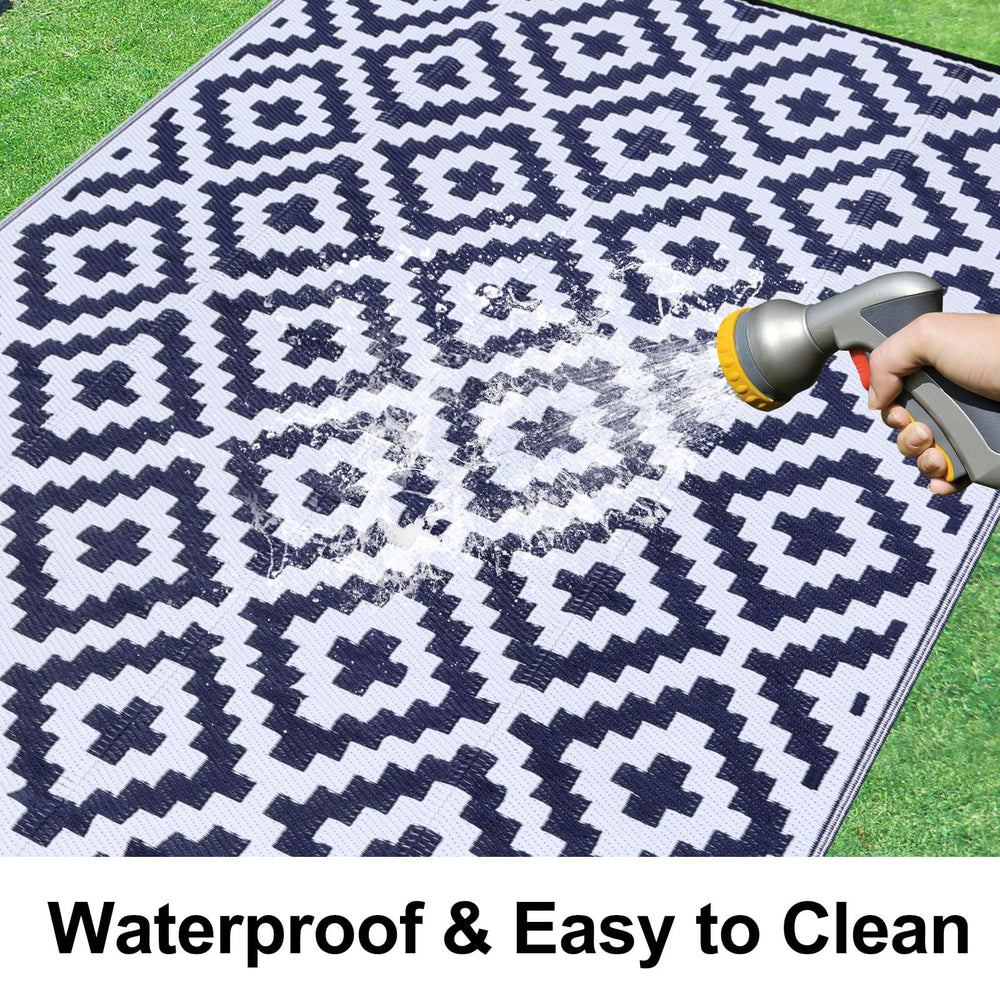 Smiry Outdoor Rug 6x9 ft rolled up with carrying bag