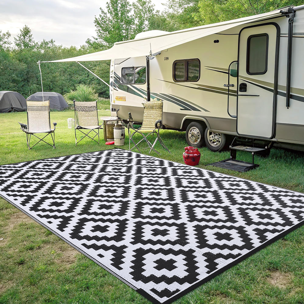Smiry Outdoor Rug 8x10 ft laid out at a picnic