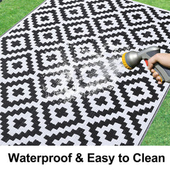 Smiry Outdoor Rug 8x10 ft rolled up in carrying bag