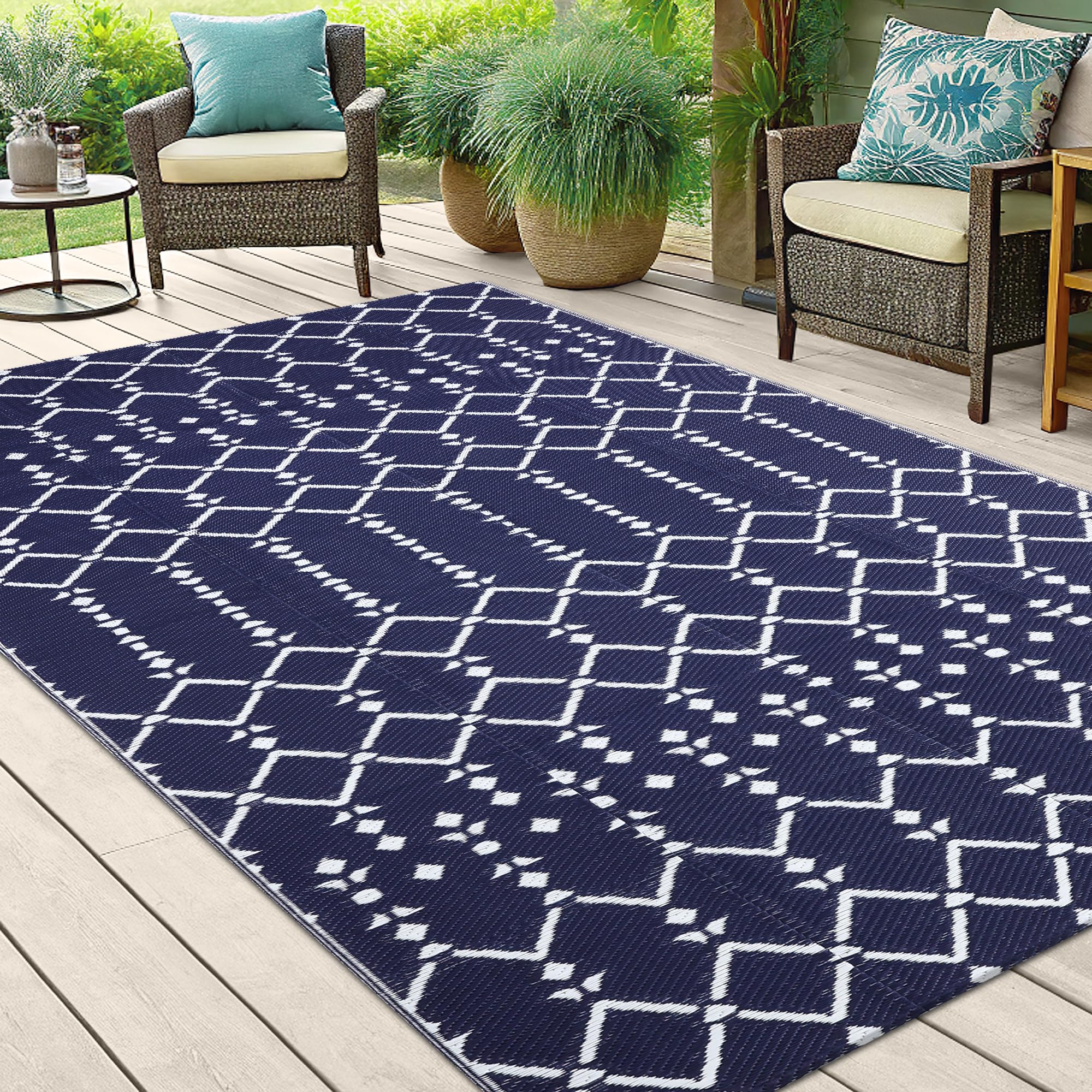 Smiry Outdoor Rug being cleaned with a hose