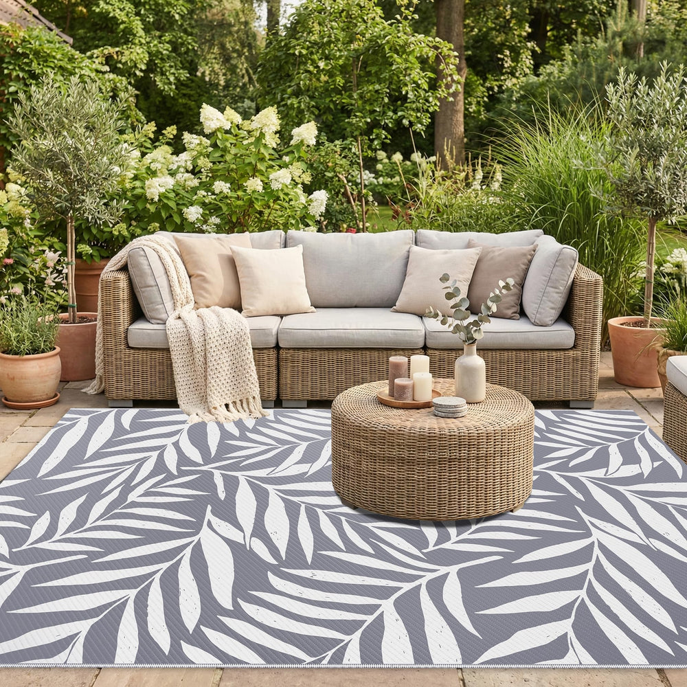 Smiry Outdoor Rug laid out on patio