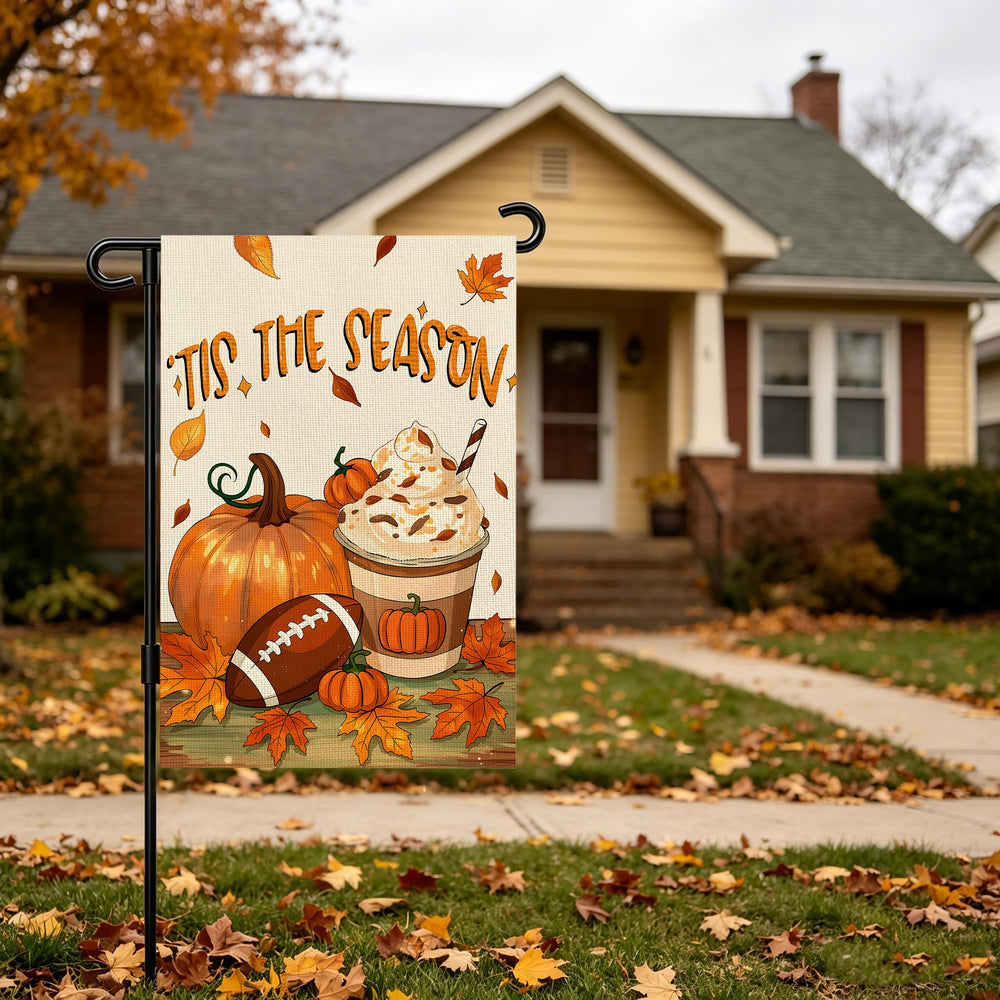 Snungee Fall Garden Flag hanging on a porch post