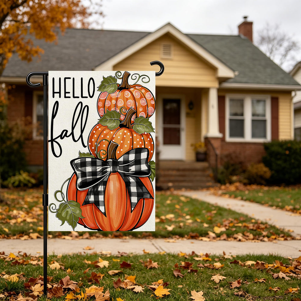 Snungee Fall Garden Flag next to other seasonal decorations