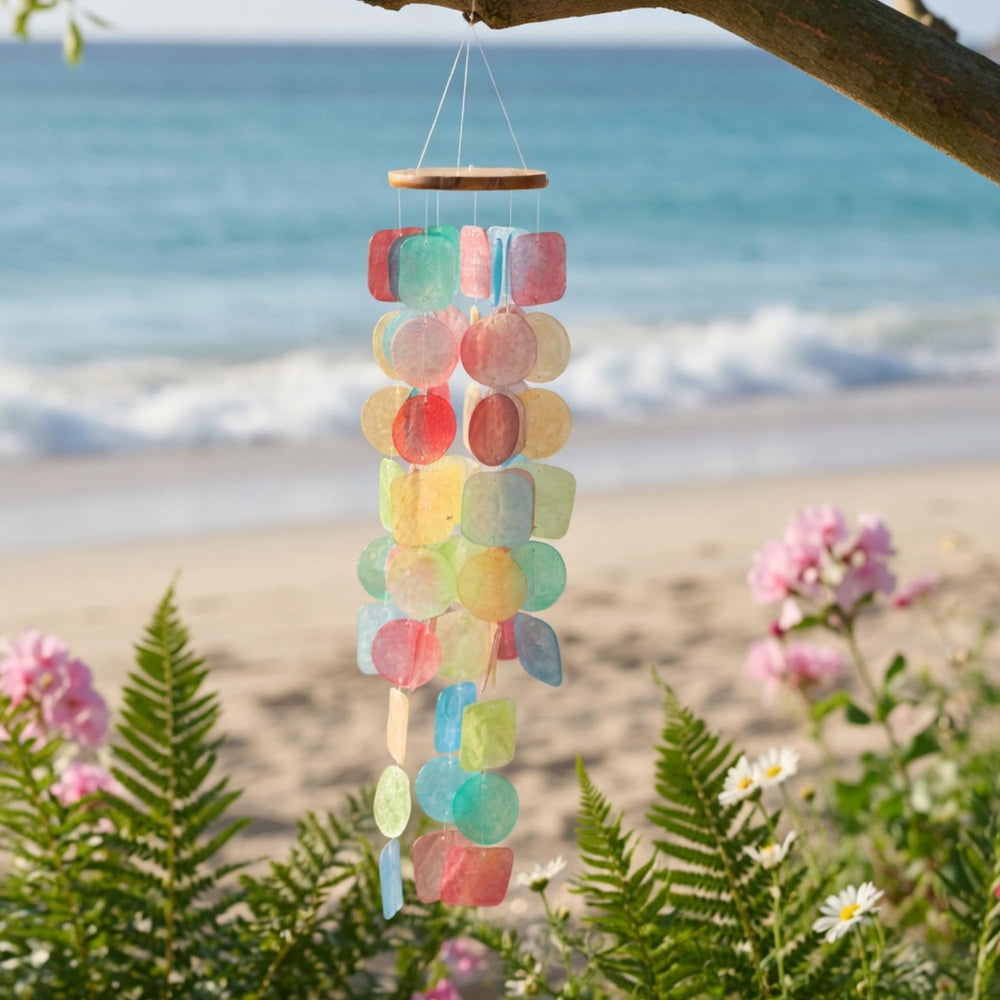 Solange & Frances Wind Chimes displayed on a porch