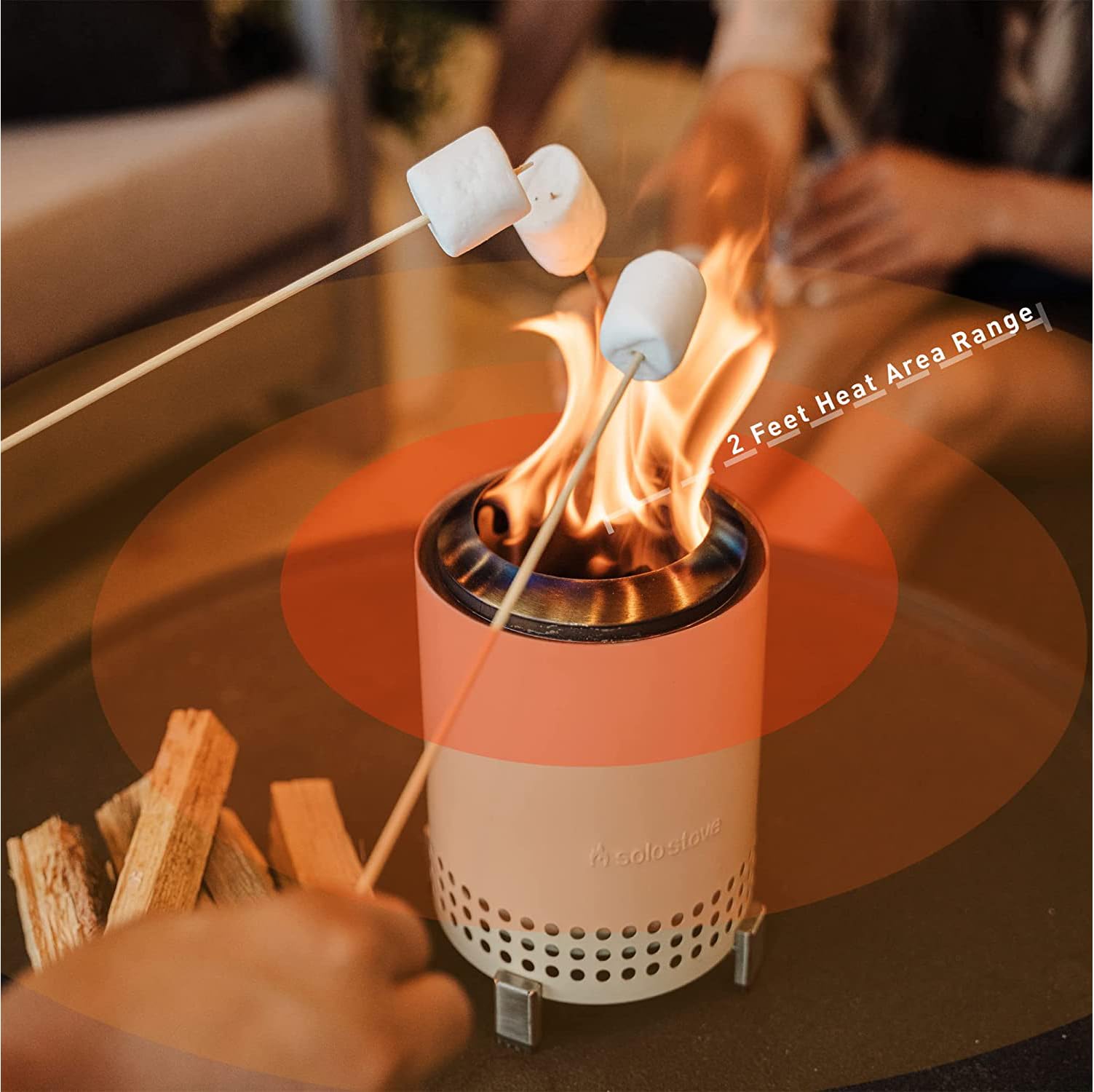 Solo Stove Mesa fire pit in use during an outdoor gathering