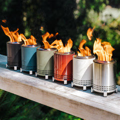 Solo Stove Mesa fire pit with flames burning