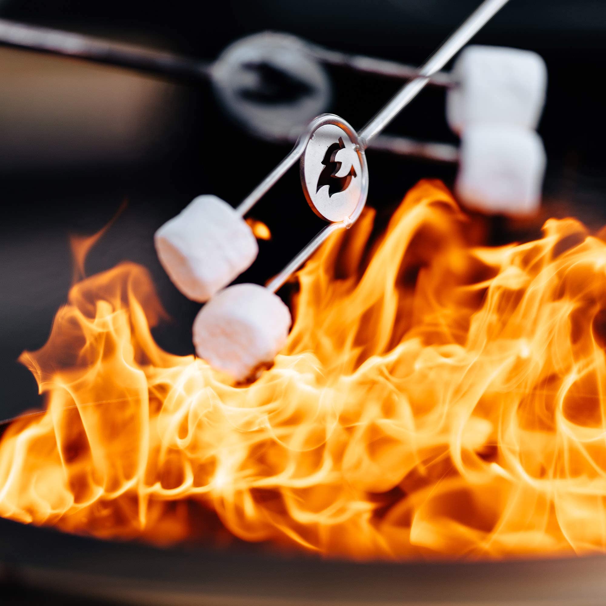 Solo Stove roasting sticks set displayed with fire pit