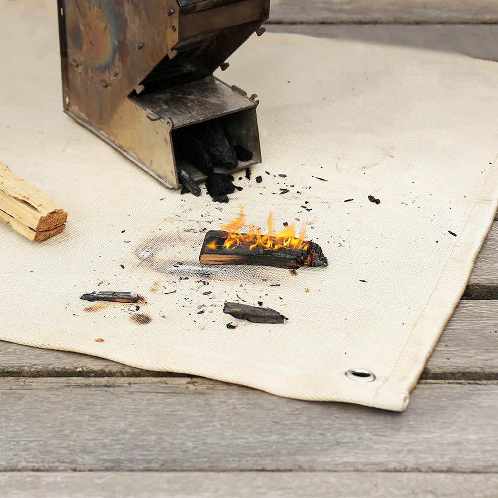 SoloWilder Fire Pit Mat in outdoor camping setup