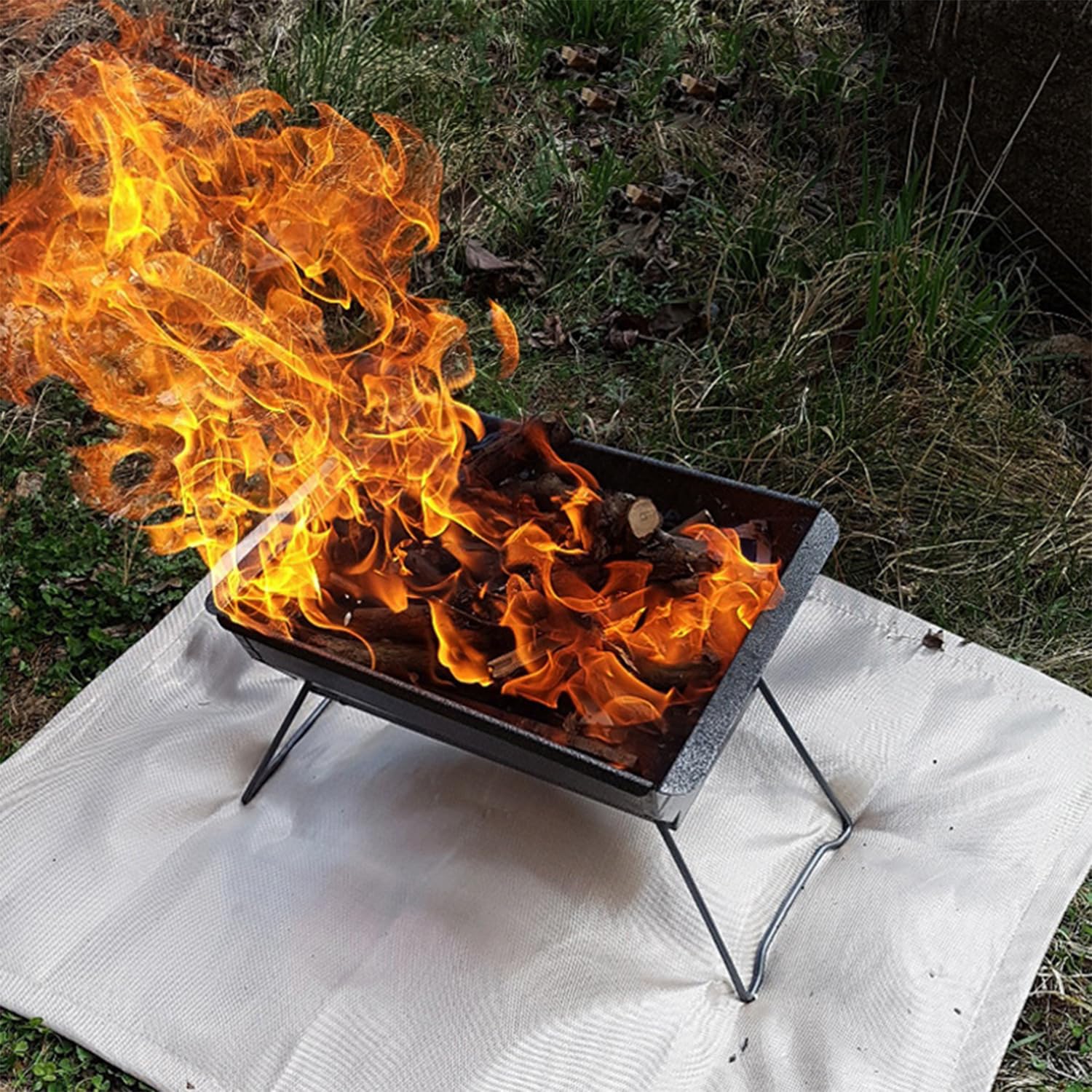 SoloWilder Fire Pit Mat used on a lawn with fire pit