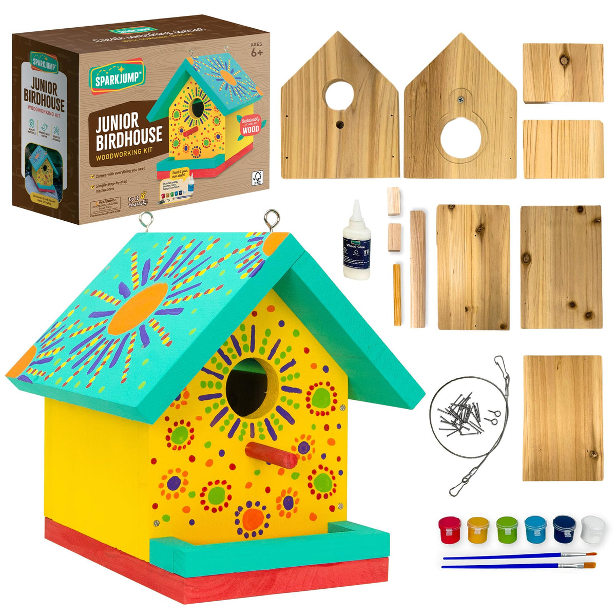 SparkJump Jr Bird House Kit contents including cedar wood pieces and paints