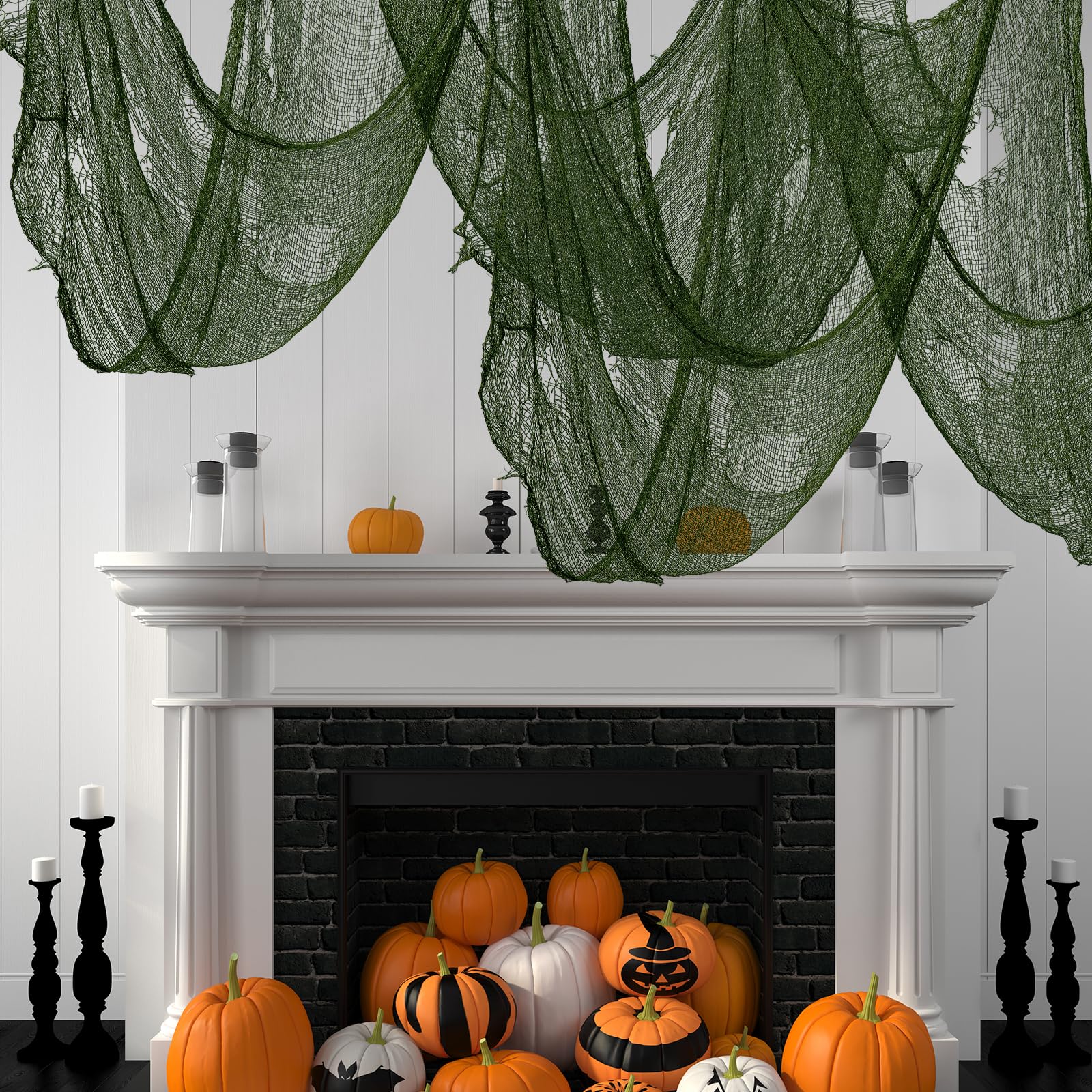 Spooky Halloween setup with green creepy cloth and decorations