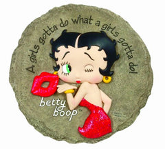 Spoontiques Betty Boop Stepping Stone in a garden setting