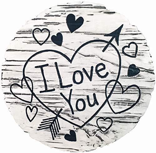 Spoontiques I Love You Stepping Stone displayed in a garden
