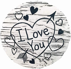 Spoontiques I Love You Stepping Stone displayed in a garden