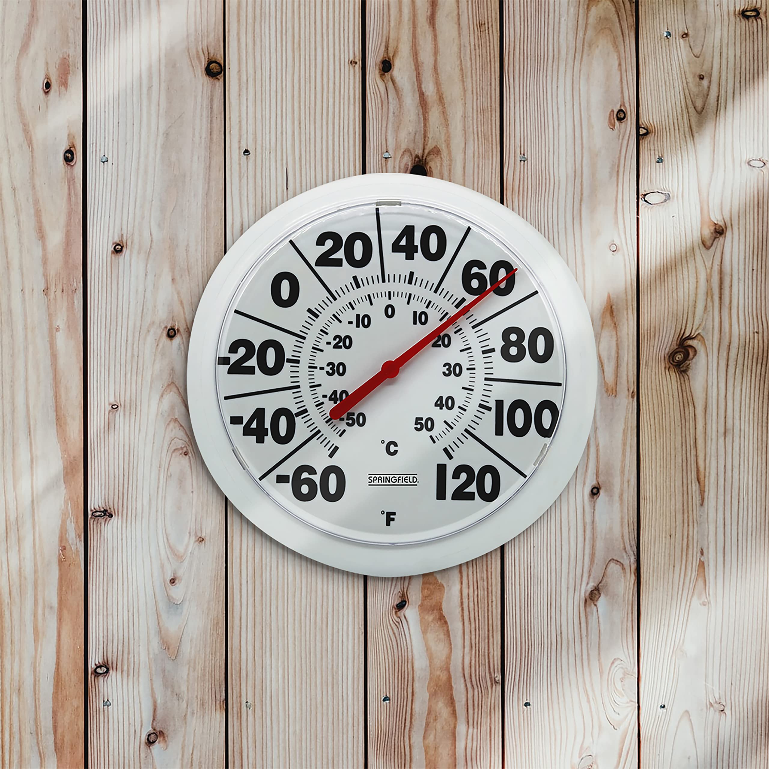 Springfield thermometer displayed on a patio table