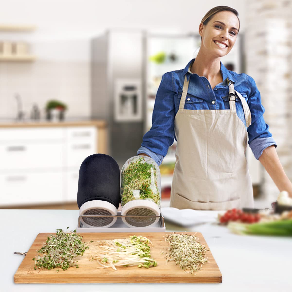 Sprouting kit setup with jars, lids, and stand