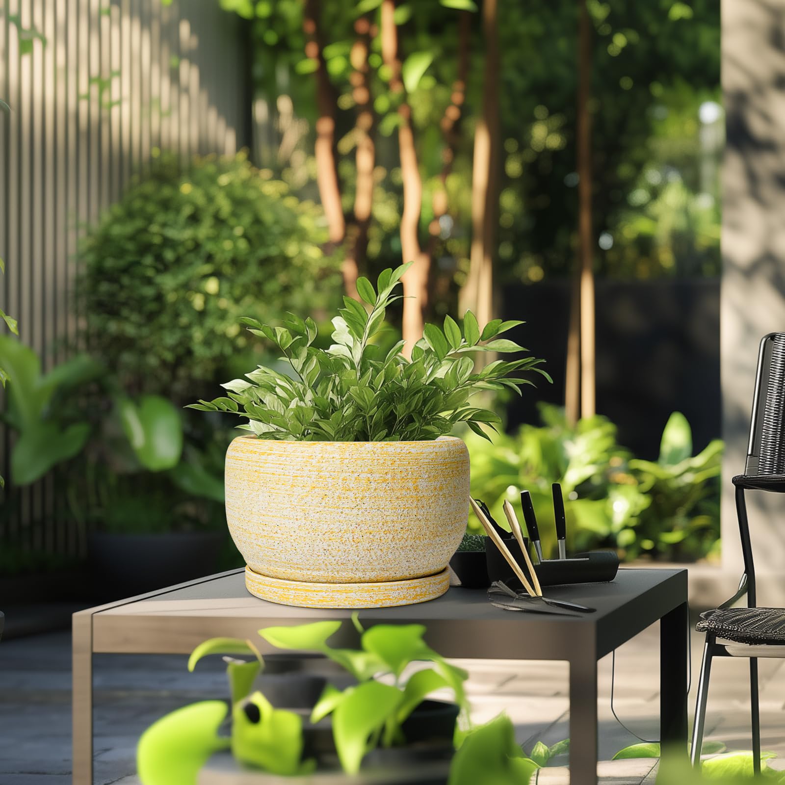 SQOWL Ceramic Planter displayed in a garden setting